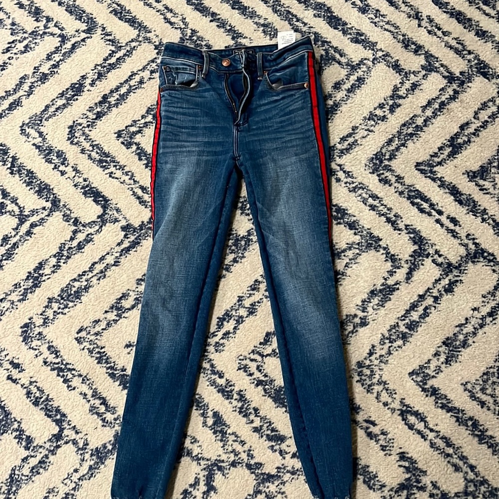 Abercrombie jeans with red stripe down the side